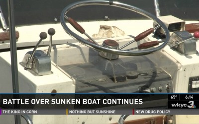 Battle Over Sunken Boat Continues